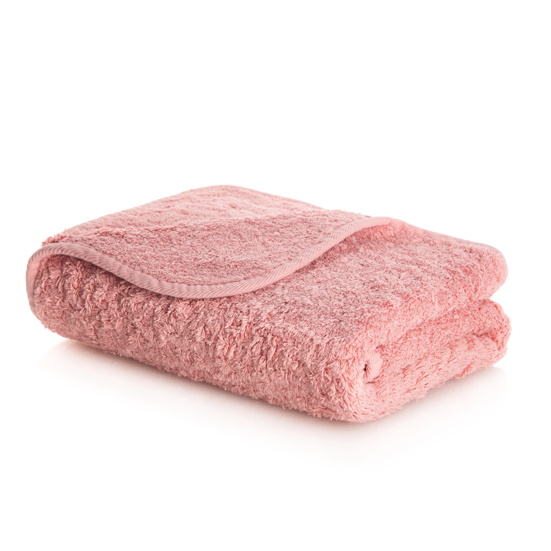 En exklusiv, fint vikt handduk modell Egoist från Graccioza i mjuk egyptisk bomull och färgtonen Blush.
